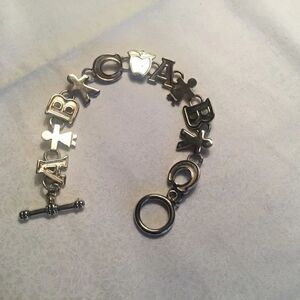 $10 ea or 3/$20. Silvertone A-B-C Teacher Bracelet